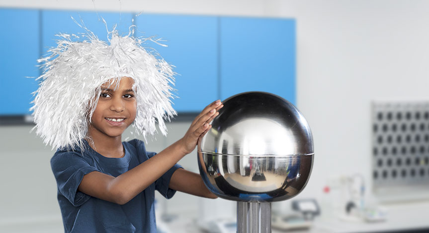 Kid with white hair touching electro ball causing his hair to stand in the air.